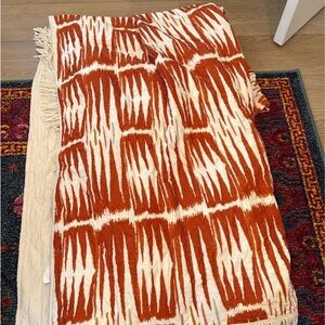 Orange and White Patterned Throw Blanket